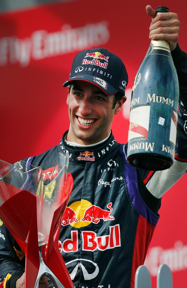 Daniel Ricciardo of Australia and Infiniti Red Bull Racing celebrates his maiden victory during the Canadian Formula One Grand Prix.