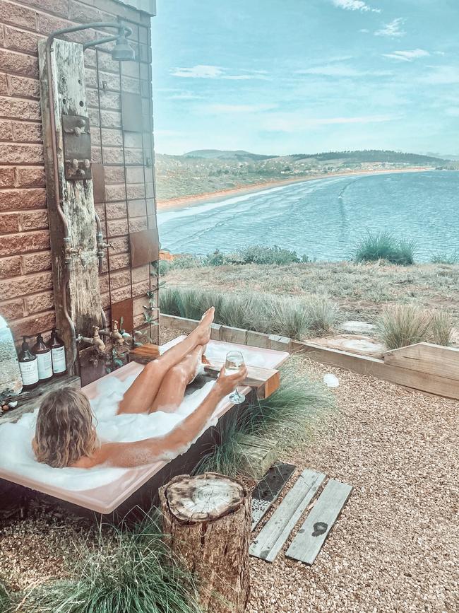 The outdoor bath at Cliff Top On Park is a great place to relax and take in the stunning coastal views. Picture: Beans Cupit