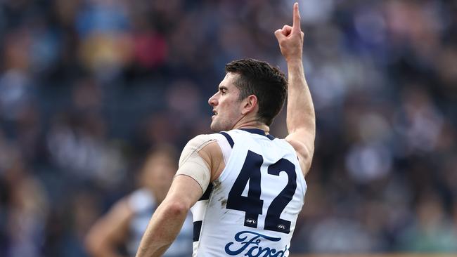 GEELONG, AUSTRALIA - APRIL 24: Mark O'Connor of the Cats celebrates after scoring a goal during the round six AFL match between the Geelong Cats and the West Coast Eagles at GMHBA Stadium on April 24, 2021 in Geelong, Australia. (Photo by Robert Cianflone/Getty Images)