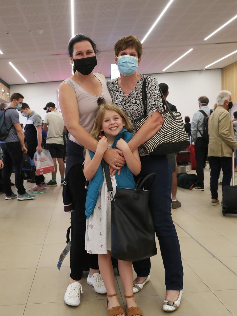 Grandmother Judy Kelly is reunited with daughter Anita Hindmarsh and granddaughter Ivy Rose Hindmarsh 6 who travelled from Sydney. Picture: Nikki Davis-Jones