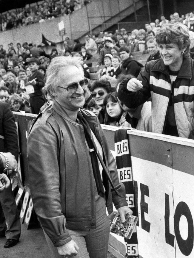 Edelsten shares a joke with supporters at Princes Park in 1985.