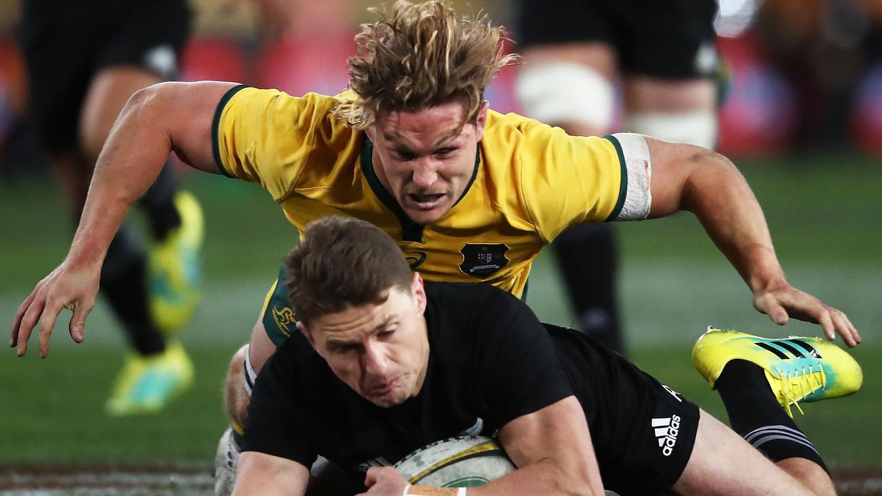 Beauden Barrett is tackled by Michael Hooper in the first Bledisloe Cup match in 2018.