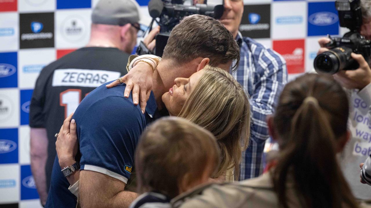 Hawkins and his wife Emma. Picture: Brad Fleet