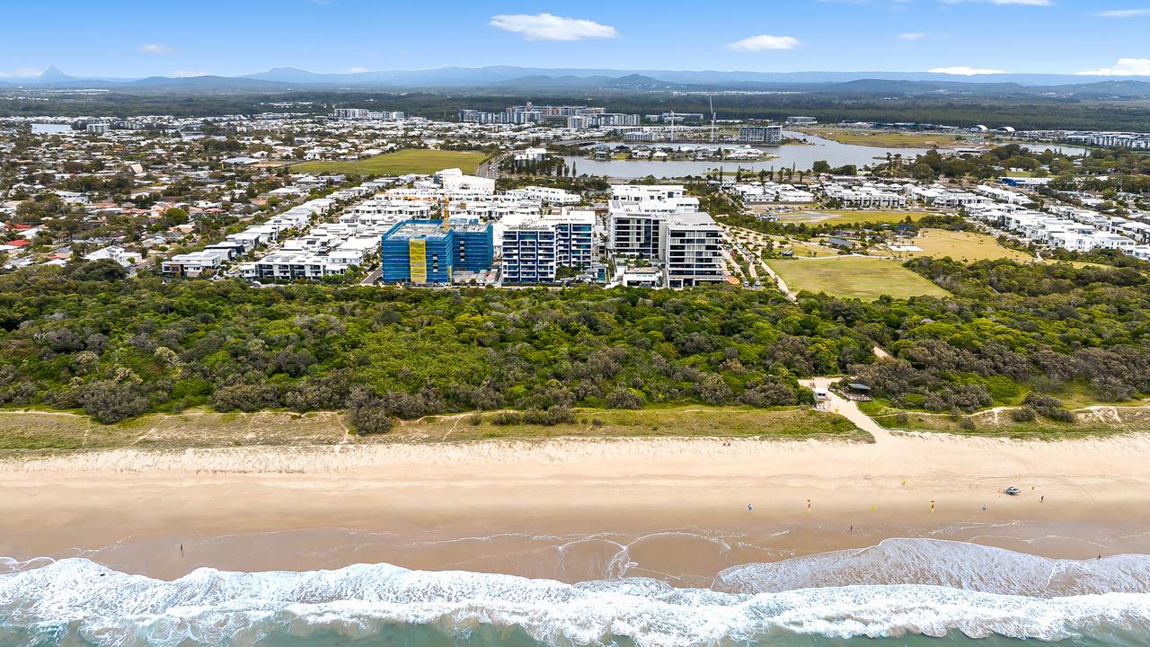 ‘9km of white sand’: The brilliant Qld beach you keep driving past