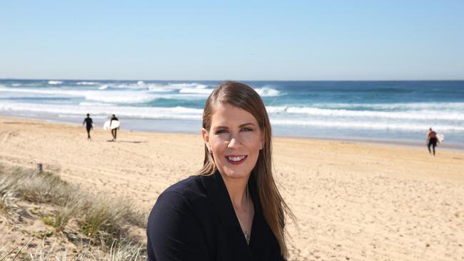 The Newcastle News newly appointed journalist Amy Ziniak at iconic Nobby's Beach. Picture: Peter Lorimer