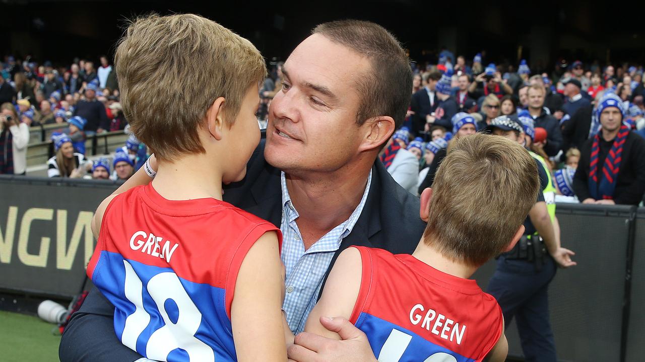 AFL Round 12. 10/06/2019. Big Freeze 5. Collingwood vs Melbourne at the MCG. Brad Green hugs his son Wilba and Oliver after lead the Demons onto the MCG in honour of their mother Anna who passed recently . Pic: Michael Klein