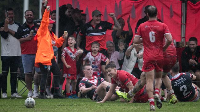 Fans celebrate Josh Woutersz’s try. Picture: Julian Andrews
