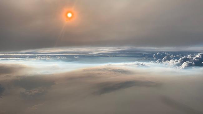 At 30,000 feet, smoke from a fire-induced thunderstorm stretched from horizon to horizon during the Williams Flats fire (Washington state), on Aug. 8, 2019. This photo was taken from the cockpit of NASA’s DC-8 Flying Laboratory. DAVID PETERSON/FIREX-AQ