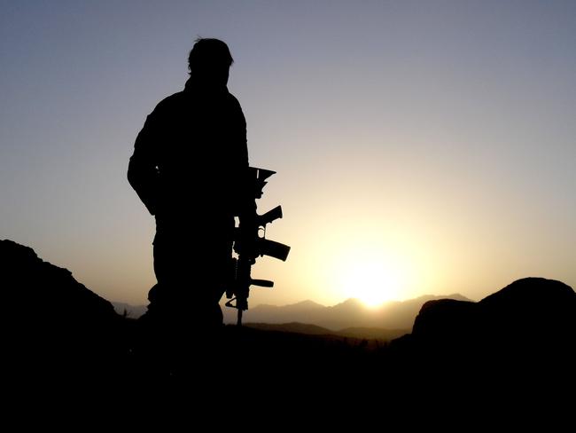 Caption: An Australian Special Operations Task Group soldiers observing the valley during the Shah Wali Kot Offensive.  Mid Caption: Shah Wali Kot Offensive   Afghan National Security Forces (ANSF) partnered with Australian Special Forces from the Special Operations Task Group conducted a deliberate operation to clear a Taliban insurgent stronghold in the Shah Wali Kot region of northern Kandahar province.  The Shah Wali Kot Offensive comprised synchronised and deliberate clearance operations involving Australian Commandos combined with a number of surgical helicopter-born assaults from Special Air Service (SAS) troops on key targets.  Removing Taliban insurgents from Afghan communities allows the Government of Afghanistan to establish a presence and gain the trust of the community to provide them with necessary infrastructure and security that was not provided by the insurgents. Picture: Department of Defence