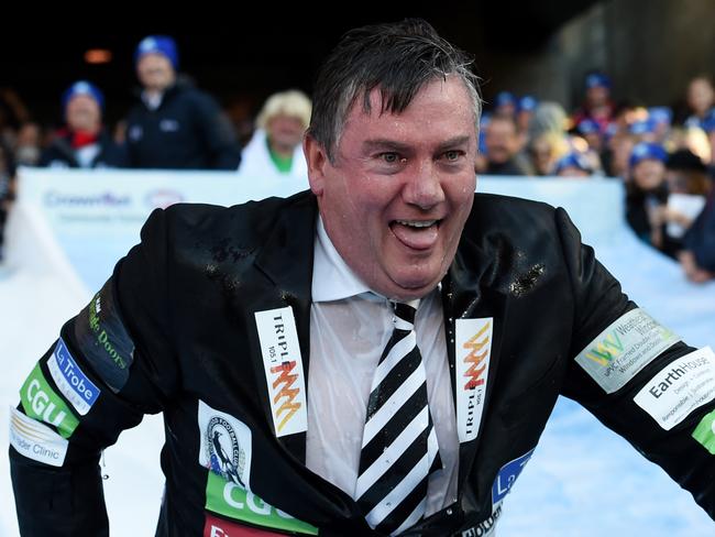 Collingwood president Eddie McGuire takes part in the Big Freeze Ice Slide challenge fundraising event.