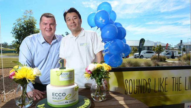 HAPPY DAY: Coles regional manager Wayne Dallinger (left) and Sekisui House Australia managing director Toru Abe celebrate Ecco Ripley’s first birthday. Picture: Rob Williams