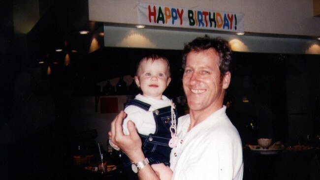 Laura Folbigg with her father Craig at her 1st birthday party.