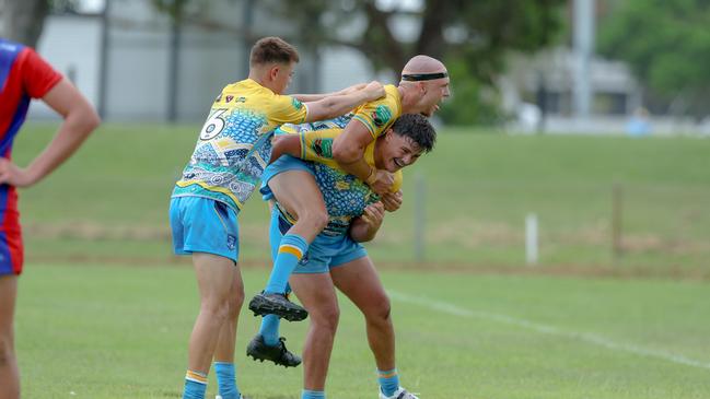 Titans celebrate a try against the Newcastle-Maitland Region Knights during round one of the Laurie Daley Cup. Picture: DC Sports Photography.