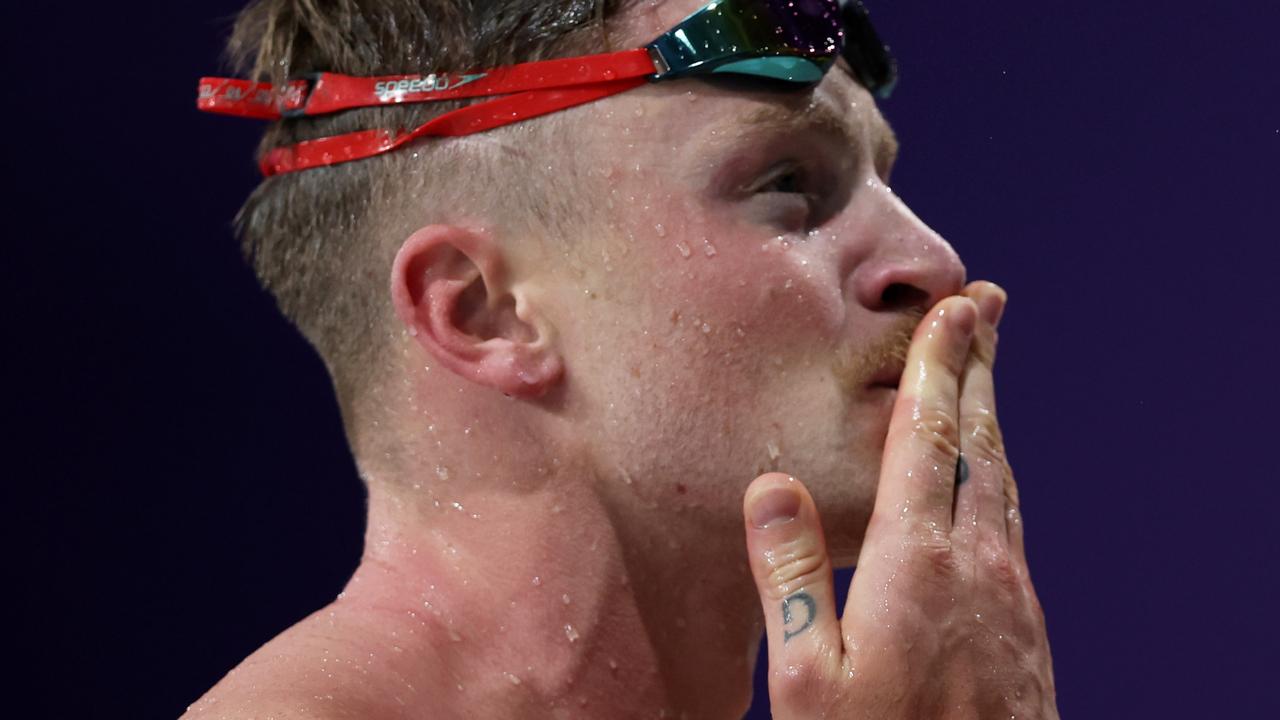 Adam Peaty of Team England blows a kiss to the crowd