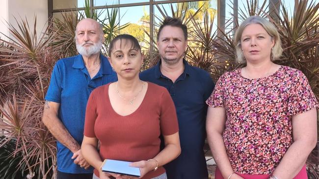 Territory grandmother Judy Smart's daughter Shannon Vickery gives a statement outside Darwin Local Court following the inquest into the 66-year-old's death, joined her father Trevor Smart, left, brother Danial and sister-in-law Tammy.