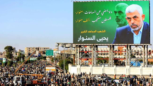 A billboard depicting Yahya Sinwar with the Arabic slogan "if Sinwar departs from the battlefields, Palestine will birth a thousand Sinwars", during a rally in Yemen's Houthi-controlled capital Sanaa. Picture: AFP.