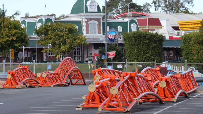 Parts of the unbuilt rollercoaster sitting in the Dreamworld carpark. Picture: Glenn Hampson.