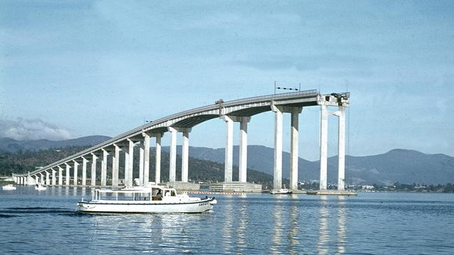 Picture Peter Rees Historical Hobarts Bicentenary 1804 - 2004 Special Supplement Accidents Water Tasman Bridge Disaster January 5th 1975 the bridge after being hit by the ship lake Illawarra