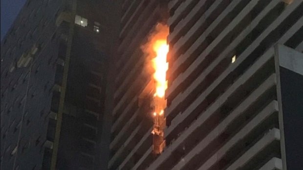 Flammable cladding, pictured at The Neo 200 apartment block in Spencer Street, has still not be removed from eight major Melbourne hospitals.