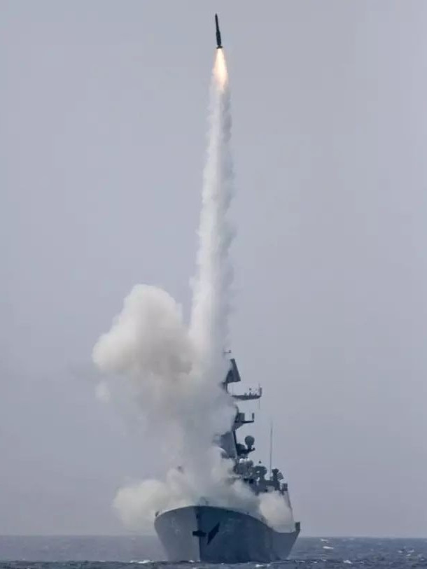 The Peoples’ Liberation Army Navy 052C destroyer Haikou Ship conducts a live fire excersise.