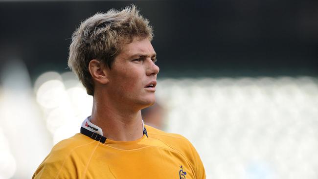 Australian rugby player Berrick Barnes carries rugby balls during the captain's run in Hong Kong on October 31, 2008. AFP PHOTO / LAURENT FIEVET