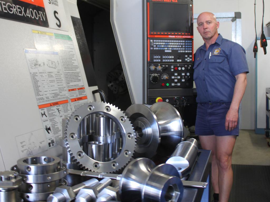 Wayne Keleher stands with his Mazak Integrex 400-IV at his Penti-M Engineering workshop. Photo Amy Haydock / Morning Bulletin