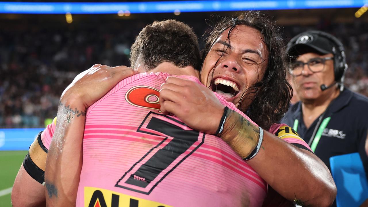 Nathan Cleary and Jarome Luai embrace after winning the 2024 NRL premiership. (Photo by Cameron Spencer/Getty Images)