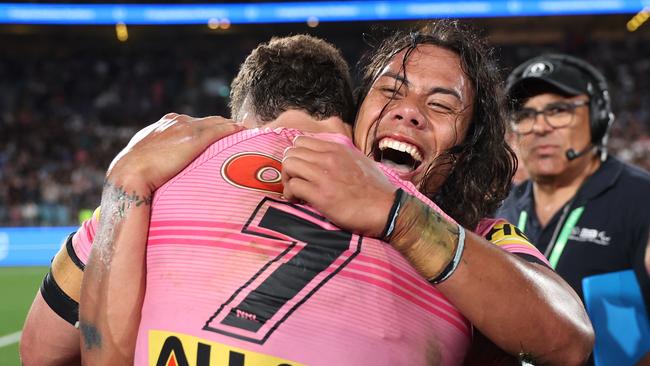 Nathan Cleary and Jarome Luai embrace after winning the 2024 NRL premiership. (Photo by Cameron Spencer/Getty Images)