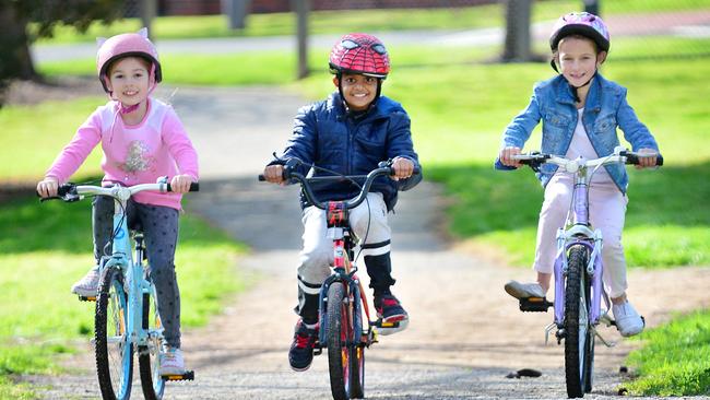 Indiana, 8, Mustafa, 7, and Giselle, 7, love riding their bikes. Picture: Nicki Connolly