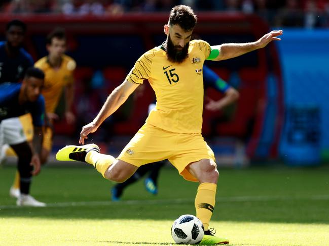 Mile Jedinak scores from the penalty spot against France at last year’s World Cup. Picture: AFP