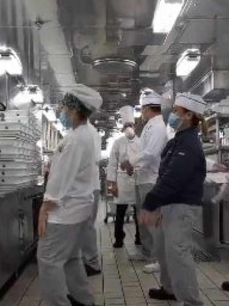 The cruise crew members started dancing to pass the time on board the Diamond Princess.