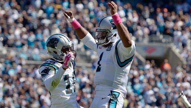 Cam Newton and Philly Brown celebrate after Brown's touchdown.