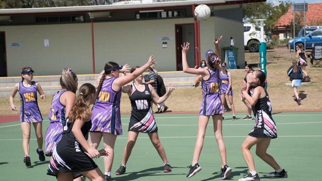 Determined efforts in the 14/15 years Division 2 grand final between Rebels 9 and Pandas 9 at the Doris Howes courts. Picture: Gary Reid