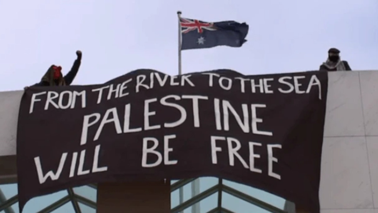 Pro-Palestinian protesters climbed onto the roof of Parliament House in Canberra to protest the war in Gaza. Picture: Sky News