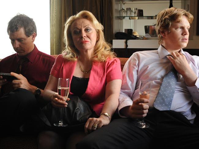 Actors Ben Mendelsohn (L), Jackie Weaver and Luke Ford in scene from 2010 film 'Animal Kingdom', nominated for an AFI Award.