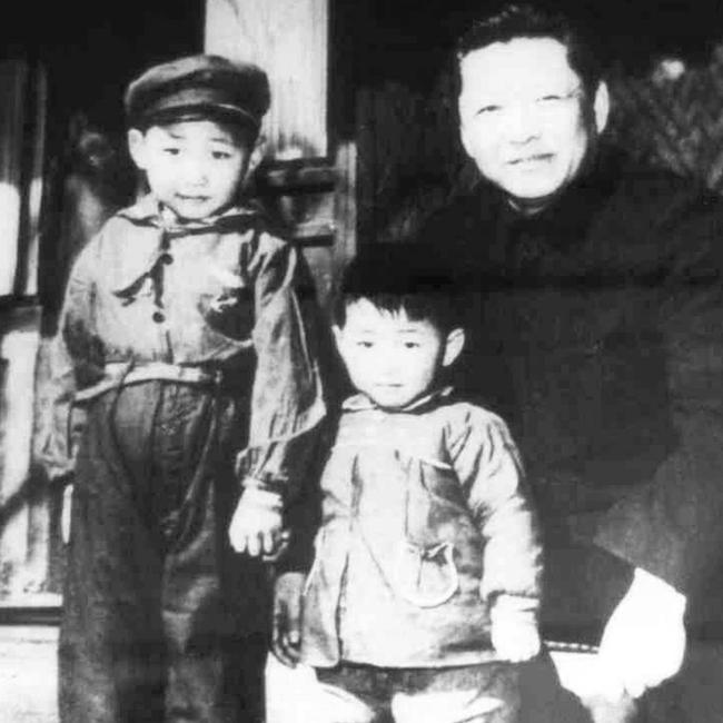 Xi, left, with his father Xi Zhongxun in 1958. Picture: Getty Images/The Times