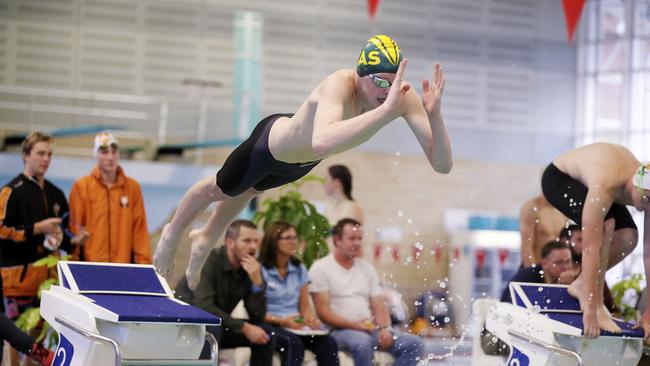 Alec Mollison takes the plunge at the Doone Kennedy Aquatic Centre School Sports Australia Swimming Compeitition. Picture: RICHARD JUPE