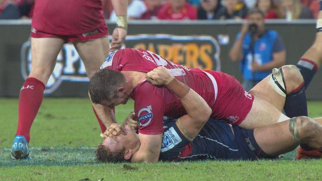 Reds lock Ed O'Donoghue was red-carded after this incident with Rebels captain Scott Higginbotham.