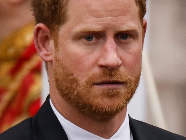 Britain's Prince Harry, Duke of Sussex leaves Westminster Abbey after the Coronation Ceremonies of Britain's King Charles III and Britain's Queen Camilla in central London on May 6, 2023. - The set-piece coronation is the first in Britain in 70 years, and only the second in history to be televised. Charles will be the 40th reigning monarch to be crowned at the central London church since King William I in 1066. Outside the UK, he is also king of 14 other Commonwealth countries, including Australia, Canada and New Zealand. (Photo by Odd ANDERSEN / AFP)