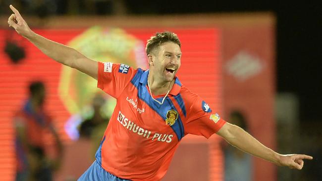 Gujarat Lions cricketer Andrew Tye celebrates a wicket.