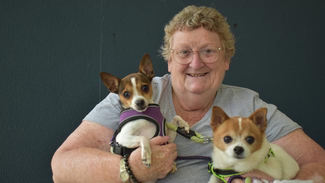 Carol Cooper at the Banora Point evacuation Centre with her two dogs. Picture: Liana Walker