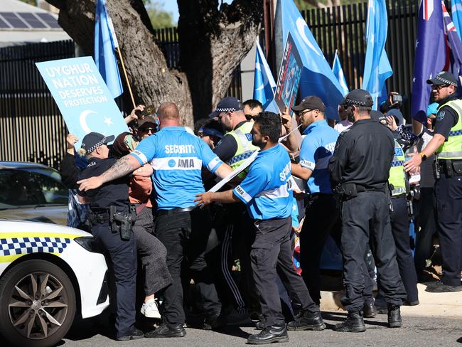 ADELAIDE, AUSTRALIA - NewsWire Photos March 30,  2021: Protesters outside the South Australian Chinese consulate in Adelaide. Picture: NCA NewsWire / David Mariuz