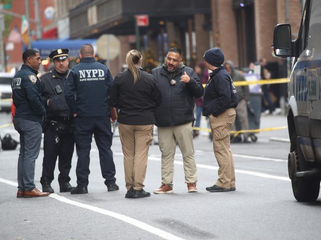 Police gather outside of a Hilton Hotel in Midtown Manhattan. Picture: Getty Images/AFP