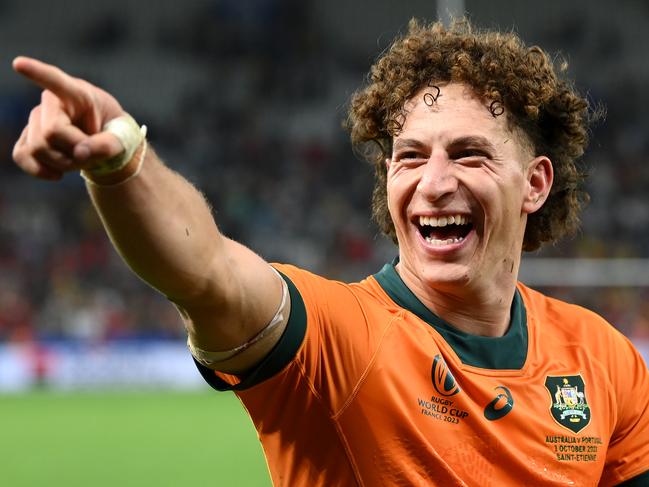SAINT-ETIENNE, FRANCE - OCTOBER 01: Mark Nawaqanitawase of Australia celebrates victory at full-time following the Rugby World Cup France 2023 match between Australia and Portugal at Stade Geoffroy-Guichard on October 01, 2023 in Saint-Etienne, France. (Photo by Stu Forster/Getty Images)