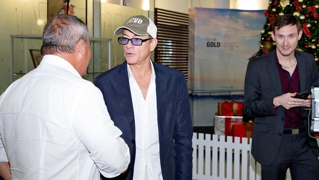 Gold Coast Bulletin journalist Andrew Potts with Mayor Tom Tate and actor Jean-Claude van Damme in 2016. Picture: Jerad Williams