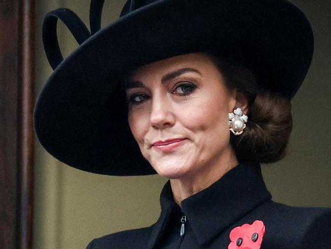 TOPSHOT - Britain's Catherine, Princess of Wales reacts as she attends the Remembrance Sunday ceremony at the Cenotaph on Whitehall in central London, on November 12, 2023. Remembrance Sunday is an annual commemoration held on the closest Sunday to Armistice Day, November 11, the anniversary of the end of the First World War and services across Commonwealth countries remember servicemen and women who have fallen in the line of duty since WWI. (Photo by TOBY MELVILLE / POOL / AFP)