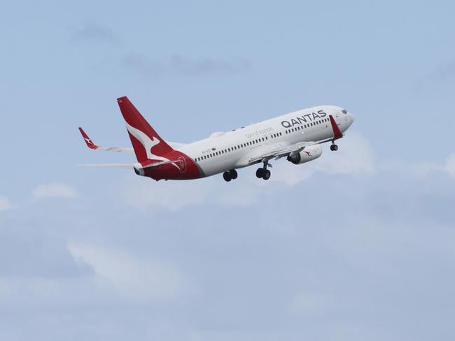 SYDNEY, AUSTRALIA - NewsWire Photos MARCH 10, 2021: A Qantas plane pictured taking off at Sydney Airport.Picture: NCA NewsWire / Damian Shaw