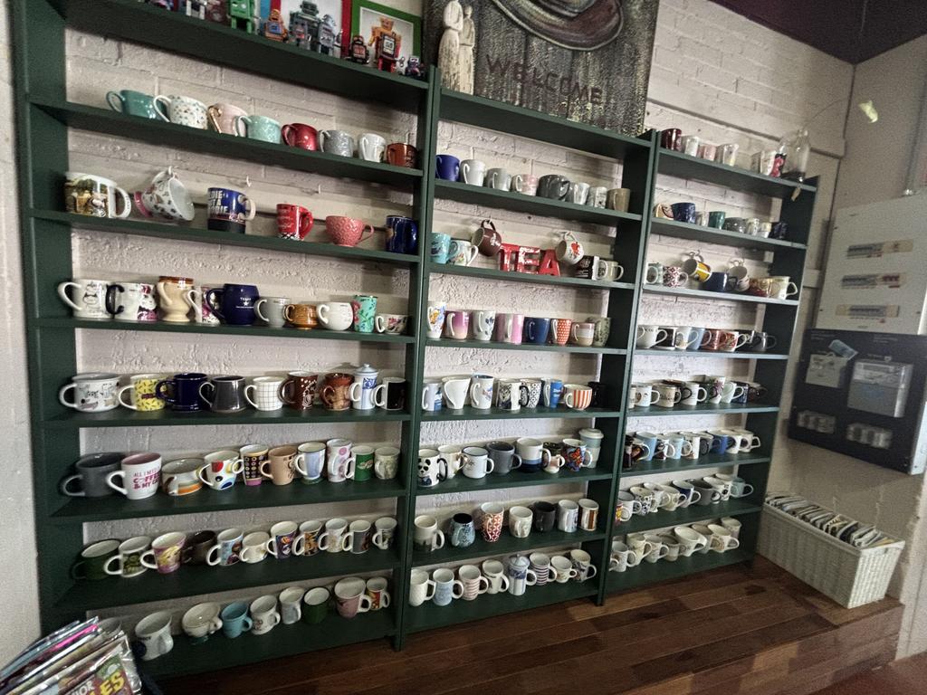 A wall of mugs for sale at Number Seventeen.