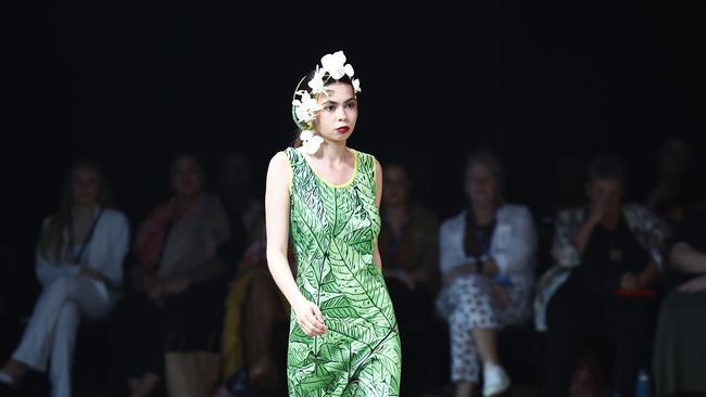 Nardia Blackhall showcases the Green Love collection from designer Bernard Singleton at the Cairns Indigenous Art Fair fashion performance, Woven, held at the Tanks Arts Centre, Edge Hill. Picture: Brendan Radke