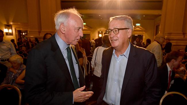 Former Prime Minister Paul Keating (left) is seen speaking with former Treasurer, Wayne Swan.